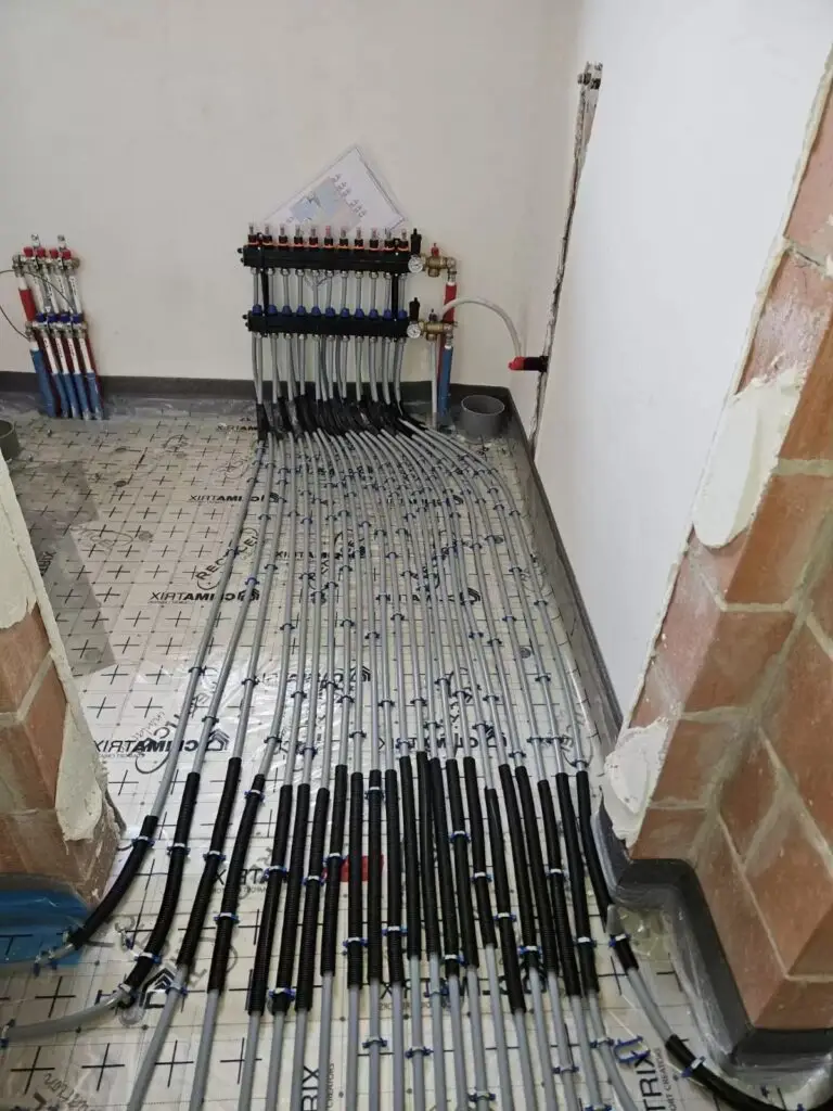 Collector met vloerverwarming in de gang, project Vloerverwarming Kasterlee