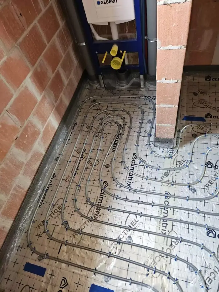 Vloerverwarming bij de aansluitingen van het sanitair, project Vloerverwarming Kasterlee